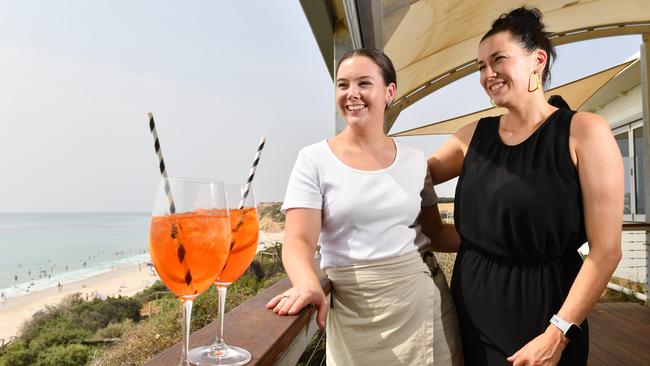 Star of Greece’s Emily Langeluddecke and Erin Rogers with one of their most popular summer drinks, an Aperol Spritz. Picture: AAP/Keryn Stevens