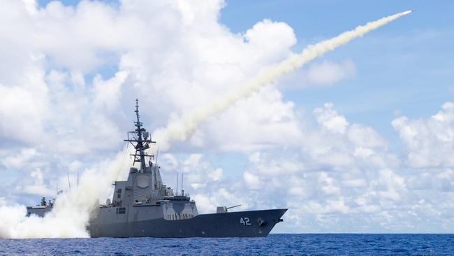 The Royal Australian Navy Hobart Class guided missile destroyer (DDG) HMAS Sydney fires a Harpoon surface to surface missile. Saab Australia’s new facility will house work including upgrading air warfare destroyers’ systems for better missile defence. Picture: Defence Imagery