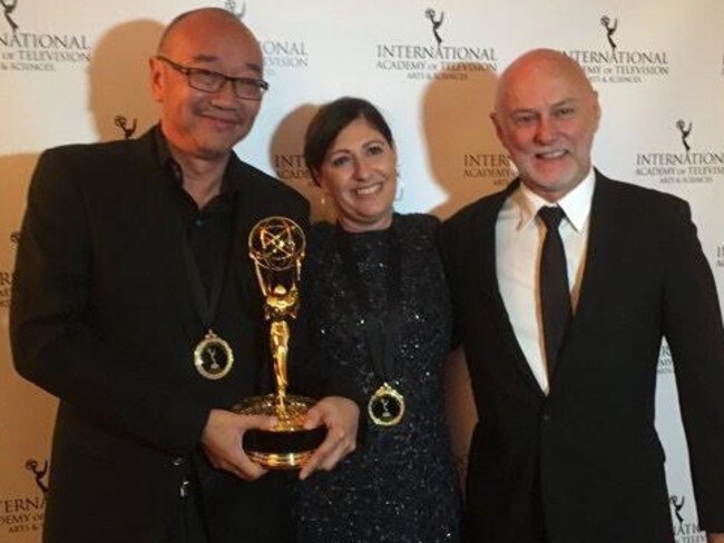 Tony Ayres, Beth Frey and Michael McMahon with their Emmy award for Nowhere Boys.