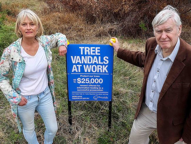 Former Bayside Mayors Graeme Disney and Felicity Frederico are outraged after vandals  poisoned trees along the Hampton Bay Trail path.It is believed local residents may be responsible so as to gain a better view of the bay from their houses. Picture : Ian Currie