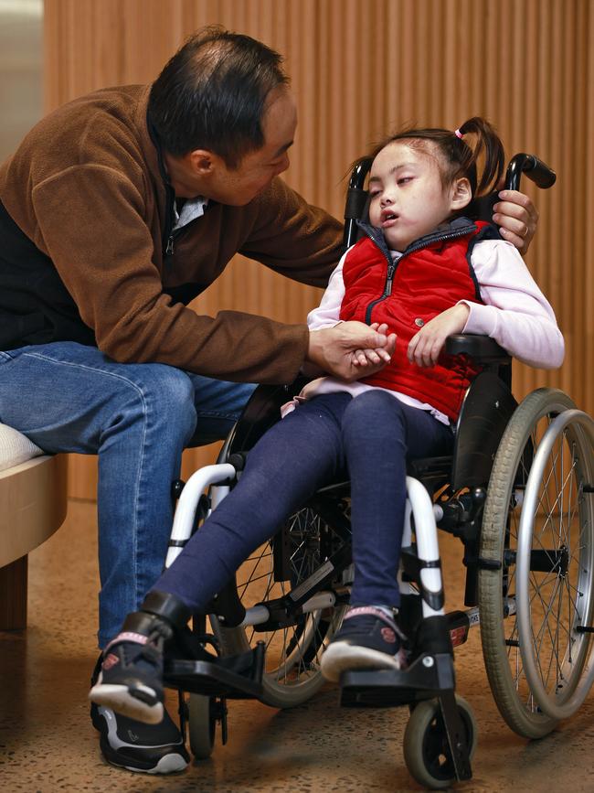 Maddy Suy and dad Alan after she underwent an operation in China. Picture: Sam Ruttyn