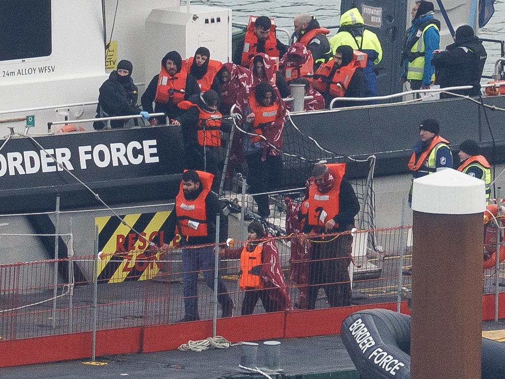 Border Force escorts a group of migrants ashore in Dover. Picture: Dan Kitwood/Getty Images