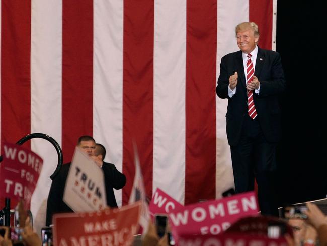 Mr Trump told a crowd of supporters at the Phoenix Convention Center he was considering a pardon for Arpaio. Picture: Ralph Freso/Getty Images/AFP