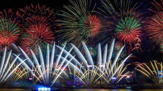 Fireworks explode over Victoria Harbour in Hong Kong. Picture: Anthony Wallace / AFP