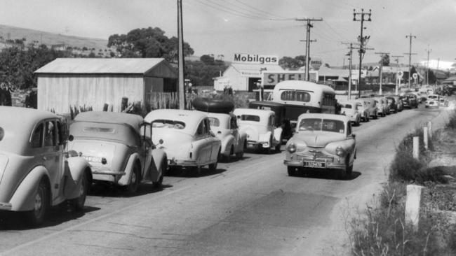 Looking from the Sturt River bridge, traffic banks up on South Rd in 1956 along the Golden Mile.