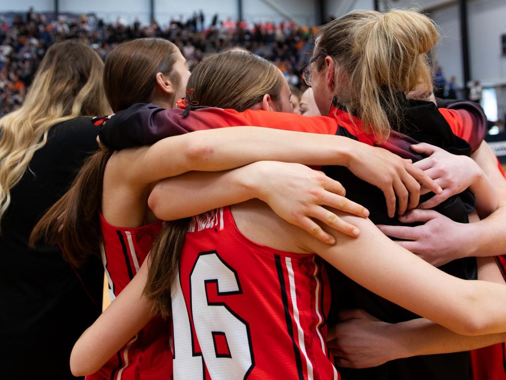 Kilsyth celebrate their win during the Championship girls gold medal match at the Basketball Australia Under-14 Club Championships.