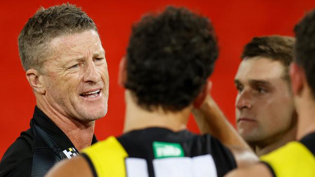 Damien Hardwick addresses his players during Friday night’s win at the Gabba.