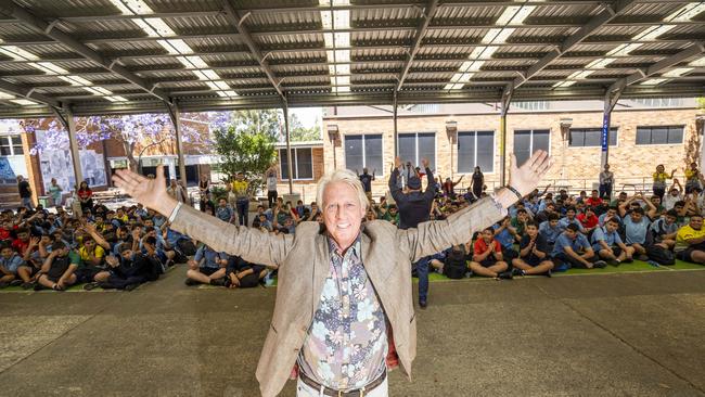 Famous alumni Jeff Thomson does the Viking clap during the special assembly. Picture: Matthew Vasilescu