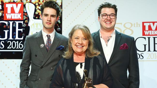 Hazlehurst with her sons (from left) William and Charlie after she was inducted into the Logie Hall of Fame in Melbourne in 2016. (Picture: Getty Images)