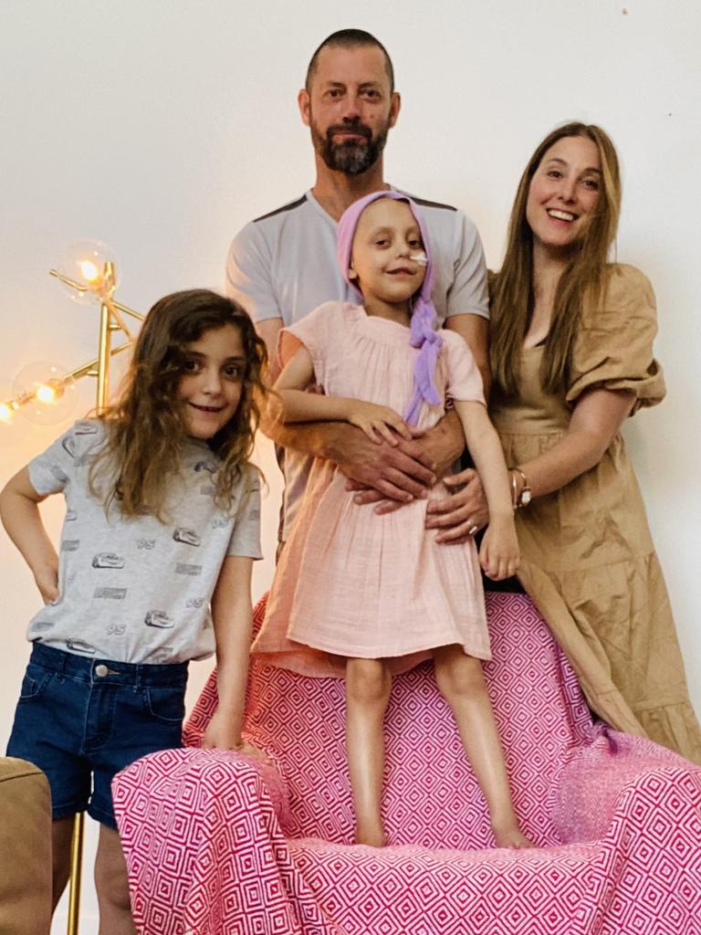 The Oxford Hotel owners Anastasia and Grant Murray, with their twin daughters Mira and Gigi. Mira, 5, passed away from a rare brain tumour last year. Picture: Supplied.