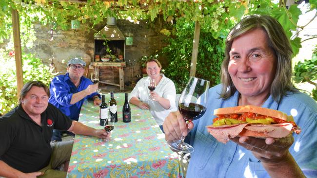 Winemakers Tim Smith, Stuey Bourne, Hutton Vale Farm's Cait Angas, and Jane Ferrari with the corned beef sandwich that will accompany their wine event. Picture: Brenton Edwards