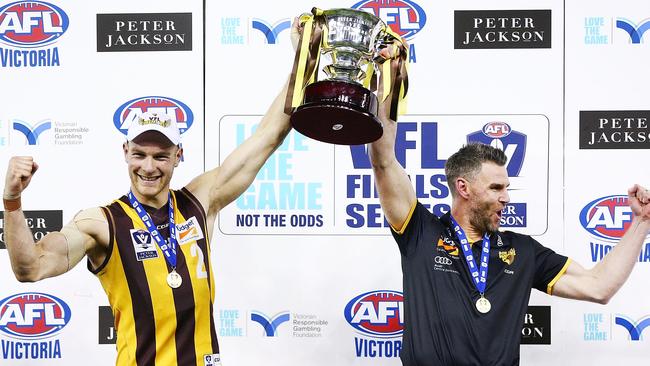 Andrew Moore celebrates Box Hill’s VFL premiership in 2018 with coach Chris Newman. Picture: Michael Dodge/AFL Media/Getty Images