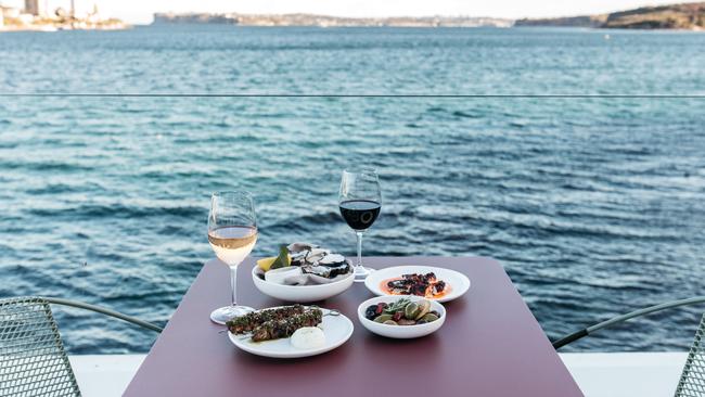 Soaking up the views at Manly Pavilion. Picture: Jessie Ann