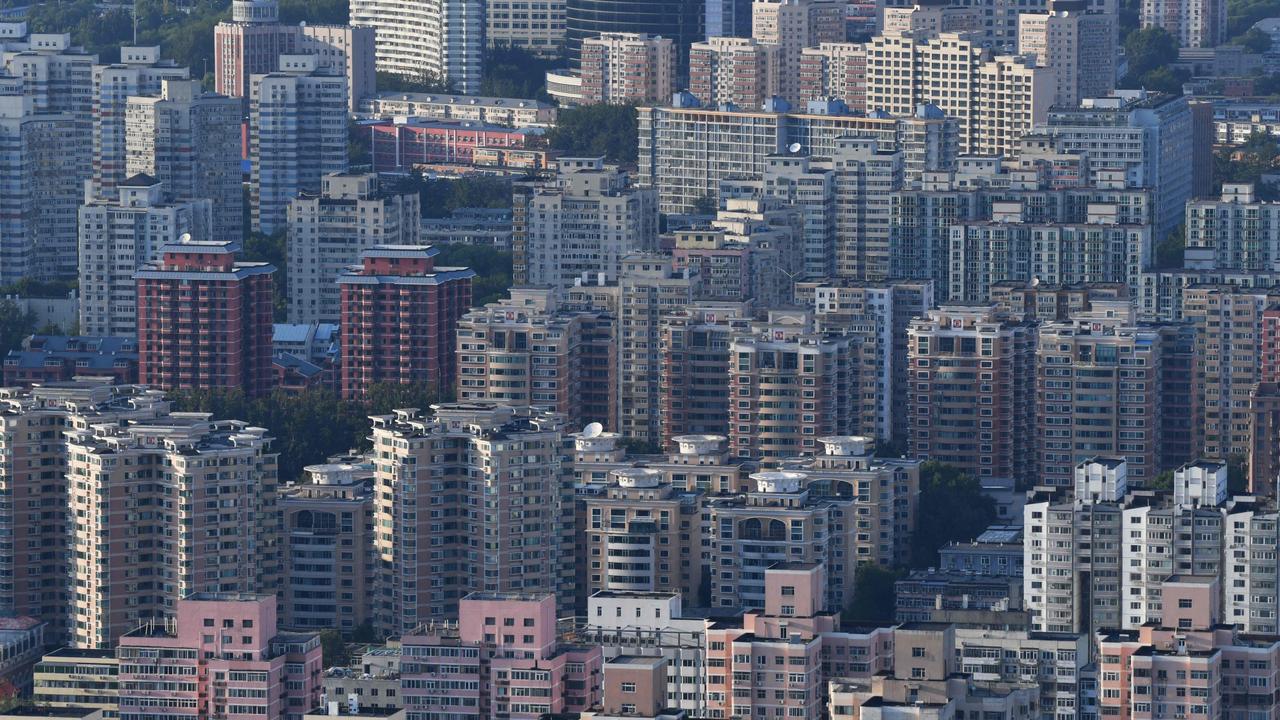 A state crackdown on China's colossal property market has helped send one of its biggest developers to the brink of collapse, and analysts warn the fallout could lead to the bursting of a bubble that has been building for more than two decades. Picture: Greg Baker / AFP