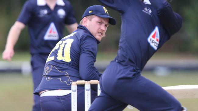 Tom Rogers sweeps for Ringwood against Geelong. Picture: Mark Wilson