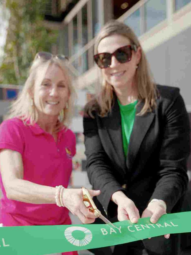 Touched by Olivia Foundation founder Justine Perkins (L) and Bay Central centre manager Heather Baard open the playground (R). Picture: Supplied
