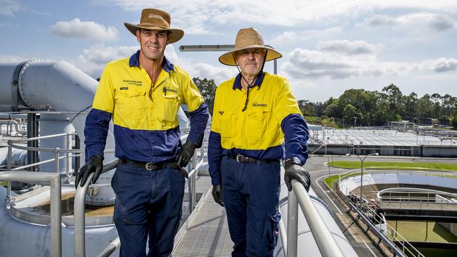 Gold Coast City Council employees Erik van den Arend and Gary Sabin at the Merrimac Waste Transfer Station. Picture: Jerad Williams