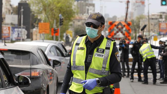 Israeli policemen are seen at a checkpoint in the city of Bnei Brak, near Tel Aviv. Picture: AFP