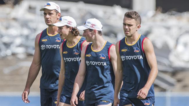 29/11/18 - Adelaide Crows training at Football Park during the demolition of the grandstands. Picture SIMON CROSS - Taylor Walker, Will Hamill, Chayce Jones and Lachlan Sholl