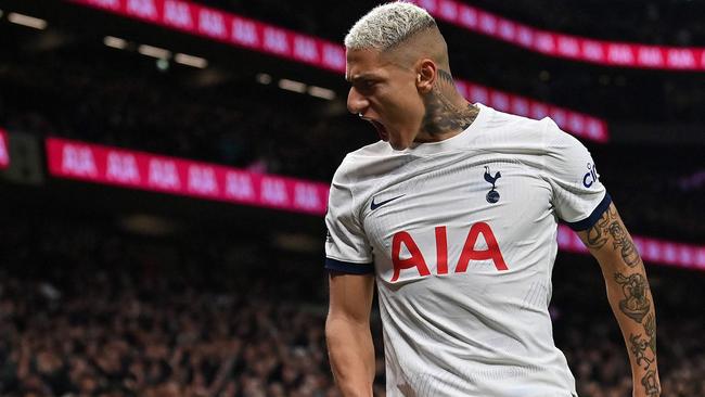 TOPSHOT - Tottenham Hotspur's Brazilian striker #09 Richarlison celebrates scoring the team's third goal during the English Premier League football match between Tottenham Hotspur and Brentford at the Tottenham Hotspur Stadium in London, on January 31, 2024. (Photo by Glyn KIRK / AFP) / RESTRICTED TO EDITORIAL USE. No use with unauthorized audio, video, data, fixture lists, club/league logos or 'live' services. Online in-match use limited to 120 images. An additional 40 images may be used in extra time. No video emulation. Social media in-match use limited to 120 images. An additional 40 images may be used in extra time. No use in betting publications, games or single club/league/player publications. /