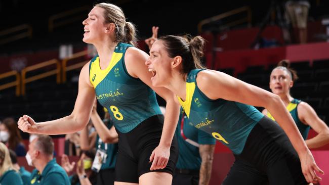 SAITAMA, JAPAN - AUGUST 02: Bec Allen #9 and teammate Sara Blicavs #8 of Team Australia cheer on their team from the bench during the first half of their Women's Basketball Preliminary Round Group C game against Puerto Rico on day ten of the Tokyo 2020 Olympic Games at Saitama Super Arena on August 02, 2021 in Saitama, Japan. (Photo by Gregory Shamus/Getty Images)