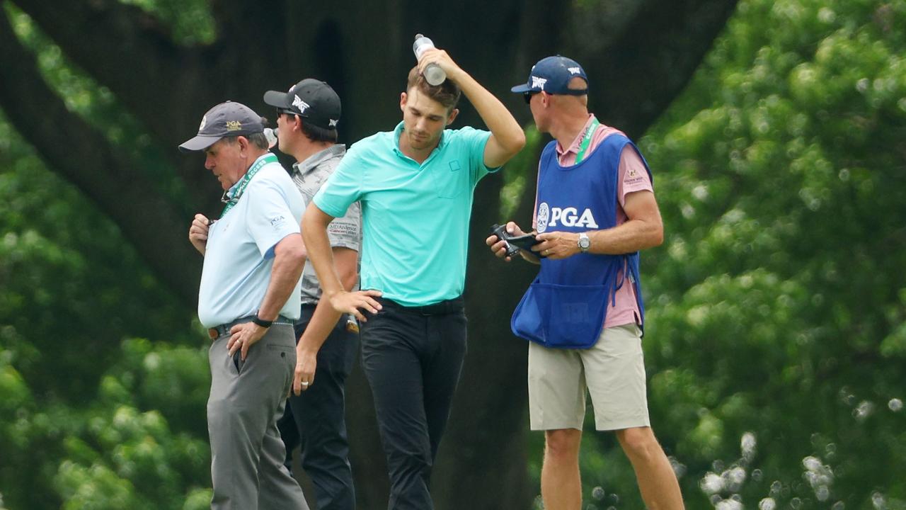 A wayward tee shot from Cameron Smith hit Aaron Wise in the head. (Photo by Andrew Redington/Getty Images)