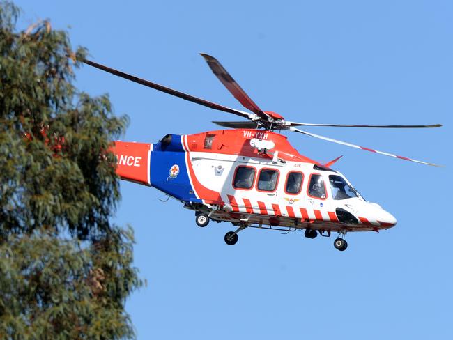 MELBOURNE, AUSTRALIA - NewsWire Photos SEPTEMBER 15, 2020: An Air Ambulance transports a man shot by police after an incident on Hutchinson St Lilydale. It is believed the man lunging at officers with a knife. Picture: NCA NewsWire / Andrew Henshaw