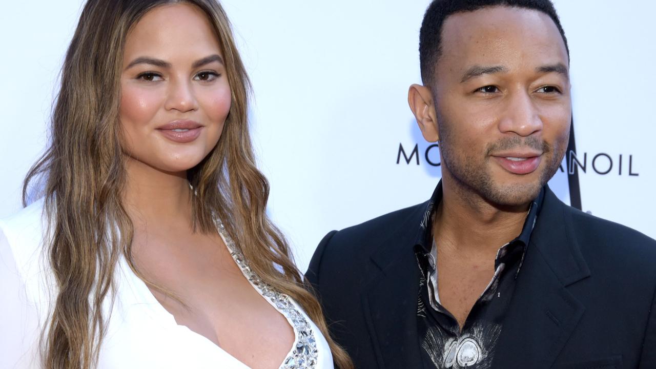 Chrissy Teigen and John Legend did the deed ‘under a blanket’ in mid-air. Picture: Tara Ziemba/AFP