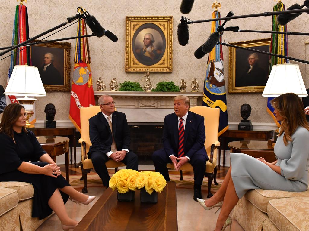 United States President Donald Trump with wife Melania and Australia's Prime Minister Scott Morrison with wife Jenny in the Oval Office after a ceremonial welcome on the south lawn of the White House. Picture: Mick Tsikas