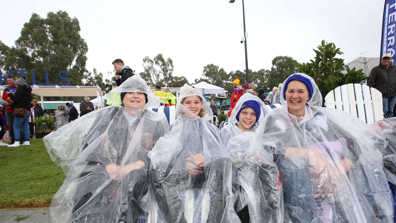 Wet fans still had the time of their lives in Mt Barker. Picture: Brett Hartwig.