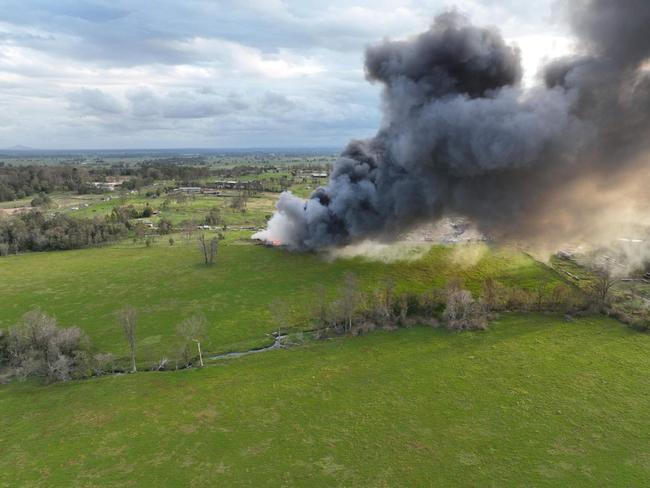 Scrapyard fire at Grafton from the air earlier in the night. The blaze has significantly worsened. Picture: Jason Smart