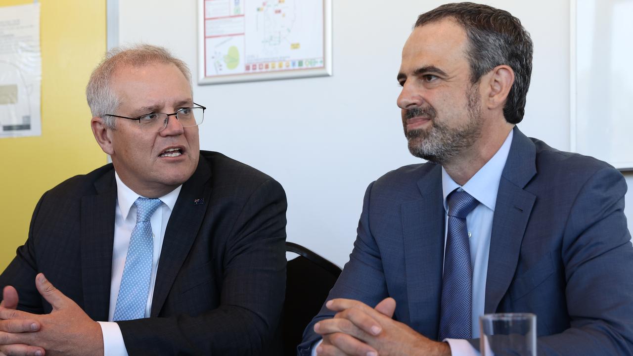 AMA President Dr Omar Khorshid (right), with Prime Minister Scott Morrison, has said that hotel quarantine is not working. (Photo by Paul Kane/Getty Images)