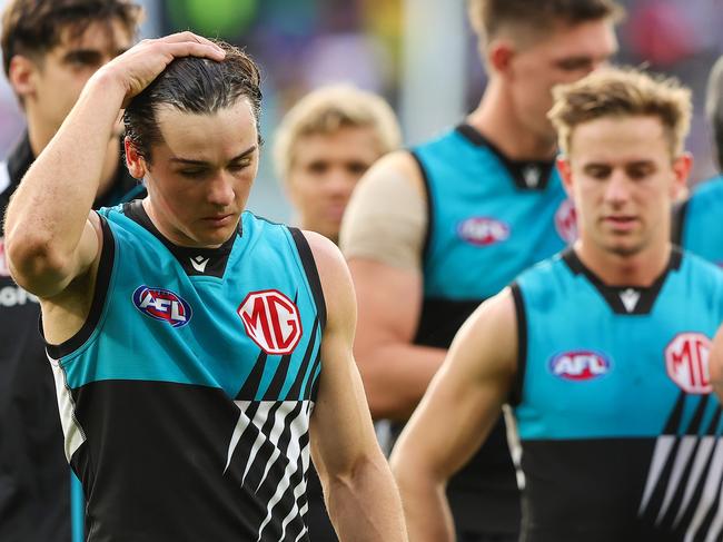 ADELAIDE, AUSTRALIA - JUNE 22: Connor Rozee of the Power leads his team off after the big loss during the 2024 AFL Round 15 match between the Port Adelaide Power and the Brisbane Lions at Adelaide Oval on June 22, 2024 in Adelaide, Australia. (Photo by Sarah Reed/AFL Photos via Getty Images)