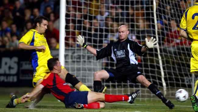 Carl Veart scores Adelaide United’s first goal in the club’s inaugural match against Brisbane Strikers in 2003. Picture: Matt Turner