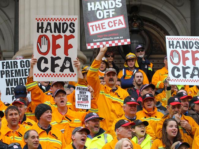 CFA volunteers rally on the steps of Parliament. Picture: David Crosling