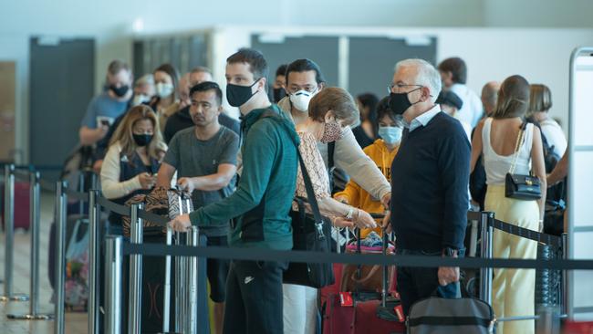 Passengers bound for New Zealand at Brisbane Internationl Airport. Picture: Brad Fleet