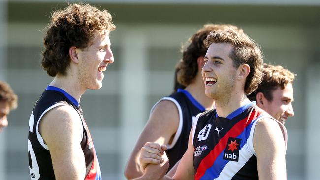 Jets players celebrate their win. Photo: AFL Photos/Getty Images.