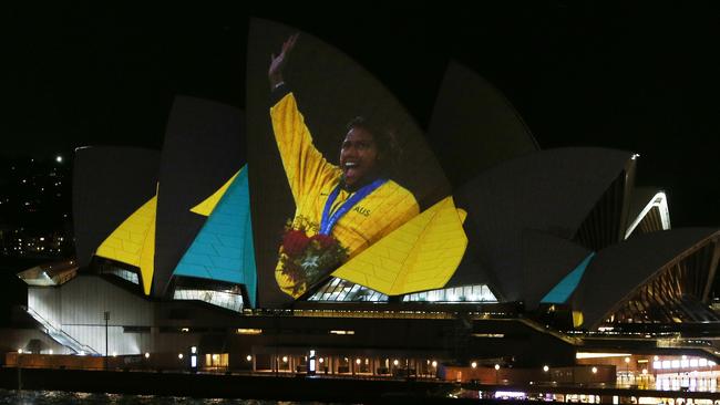 The stunning image of Cathy Freeman with her gold medal. Picture: Lisa Maree Williams/Getty Images