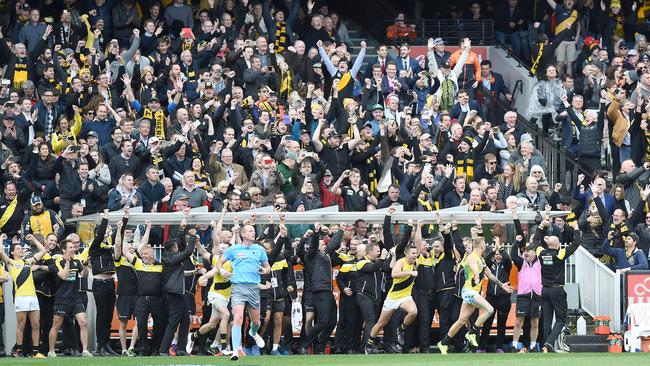 The Richmond bench celebrates on the siren. Picture: Nicole Garmston