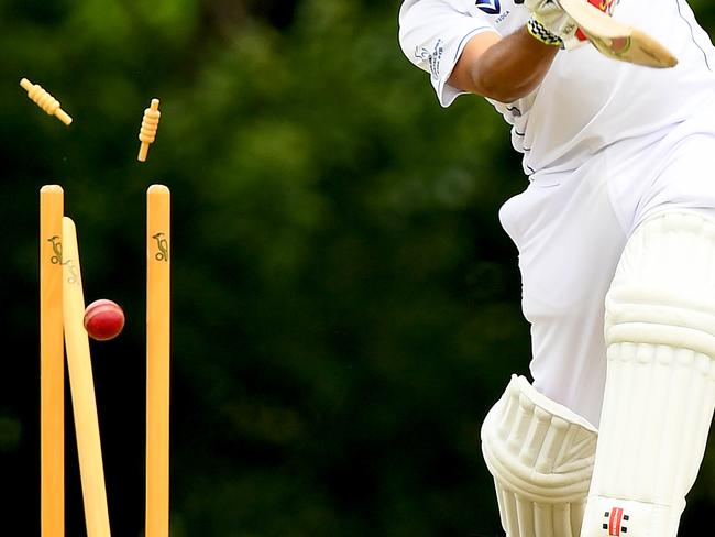 Aamir Raza of Taylors Lakes is bowled by Jonathan Kuch of Ivanhoe during the VSDCA match between Ivanhoe and Taylors Lakes at Ivanhoe Park, on November 25, 2023, in Melbourne, Australia. (Photo by Josh Chadwick)