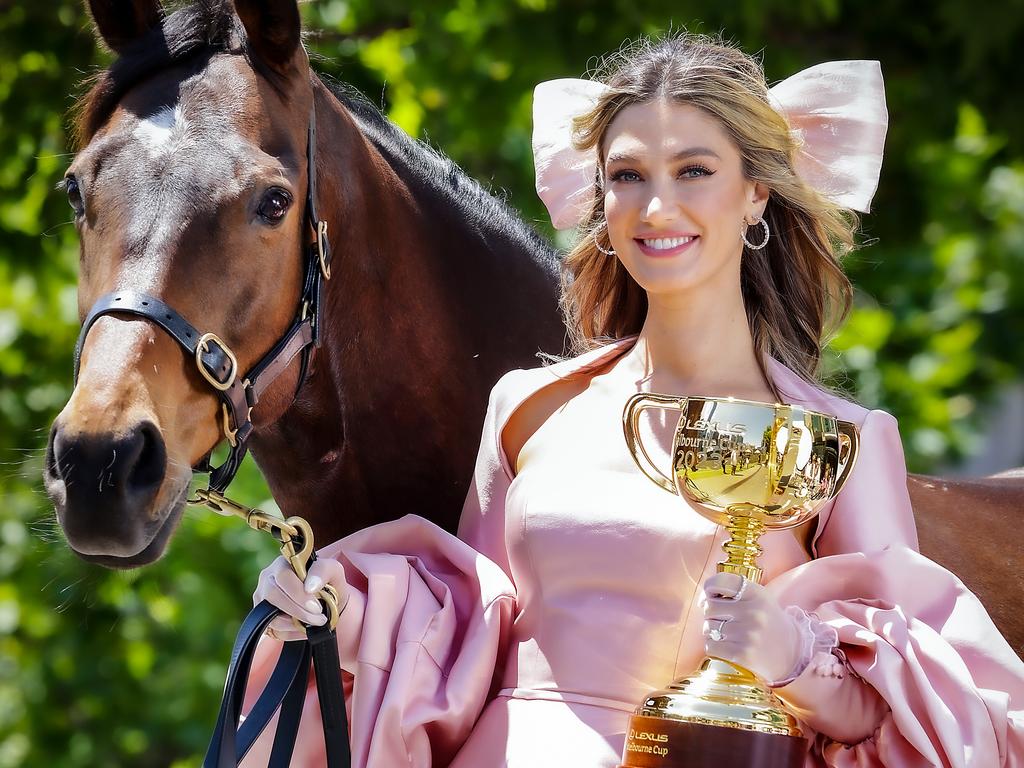 Delta Goodrem with the Melbourne Cup and 2020 winner Twilight Payment. Picture: Ian Currie