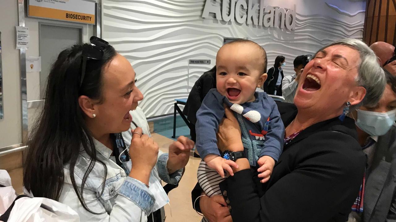 Ashleigh greets her mother Marleen at Auckland Airport and introduced her grandson Boston to her for the first time. Picture: Michael Neilson/New Zealand Herald