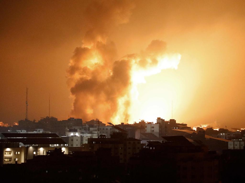 Fire and smoke rises above buildings during an Israeli air strike in Gaza City. Picture: AFP