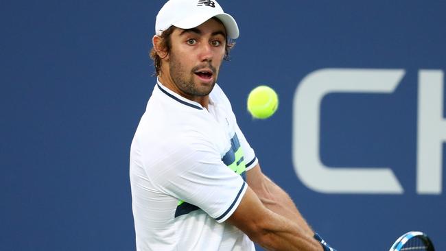 NEW YORK, NY — AUGUST 28: Jordan Thompson of Australia returns a shot during his first round Men's Singles match against Jack Sock of the United States on Day One of the 2017 US Open at the USTA Billie Jean King National Tennis Center on August 28, 2017 in the Flushing neighbourhood of the Queens borough of New York City. Al Bello/Getty Images/AFP == FOR NEWSPAPERS, INTERNET, TELCOS &amp; TELEVISION USE ONLY ==