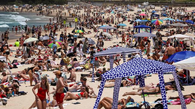 Australians enjoying the best that summer has to offer have every reason to be optimistic. Picture: AFP