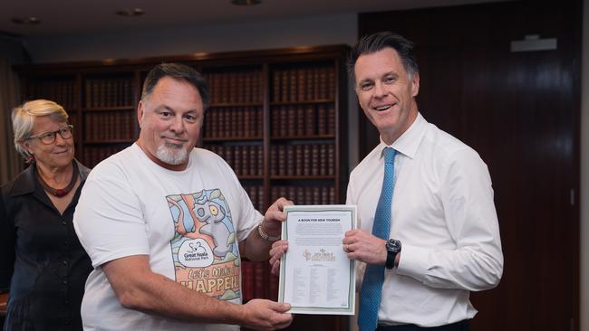 Coffs Skydiver owner Steve Hill presenting the letter to NSW Premier Chris Minns. Picture: Supplied