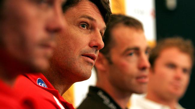 Swans coach Paul Roo with Hawthorn coach Alastair Clarkson. Picture: Brett Costello.