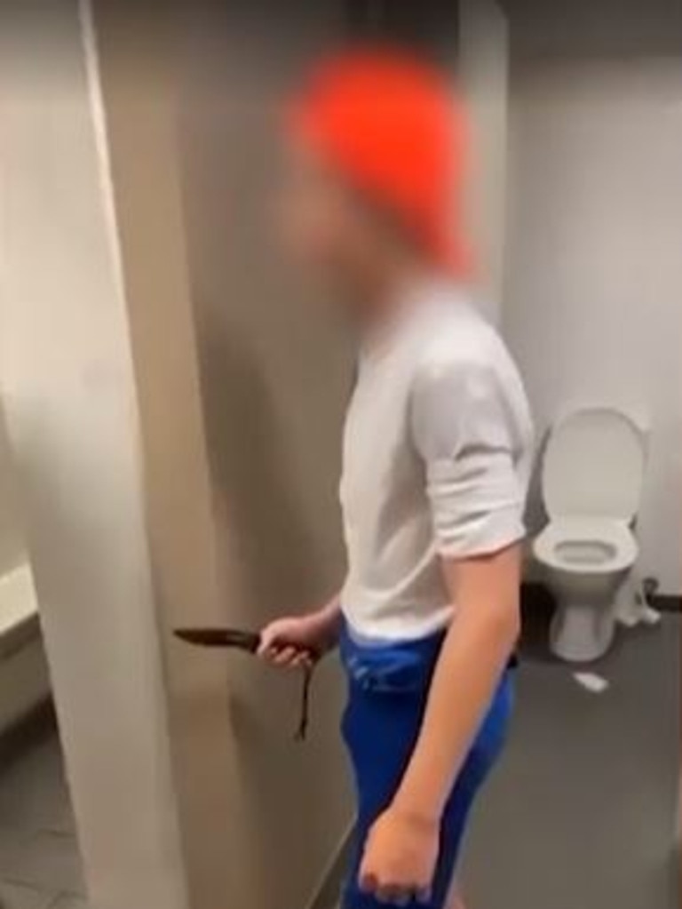 A Churchie student has been videoed in possession of a knife while in the company of other students.