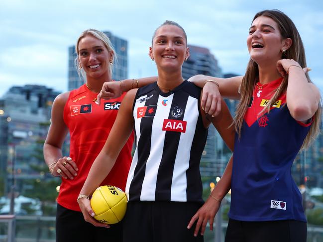 Havana Harris of the Suns, Ash Centra of the Magpies and Molly O'Hehir of the Demons. Picture: Morgan Hancock/AFL Photos/Getty Images.