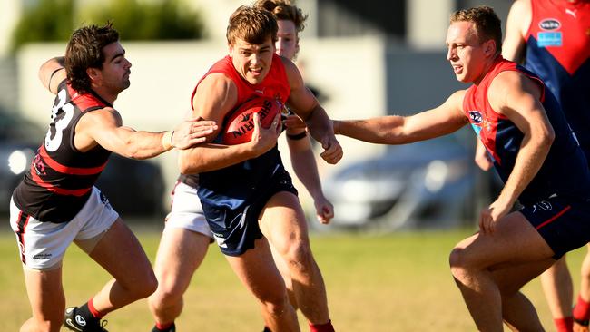 VAFA: Harry Hynes bursts through the pack for Old Brighton. Picture: Josh Chadwick